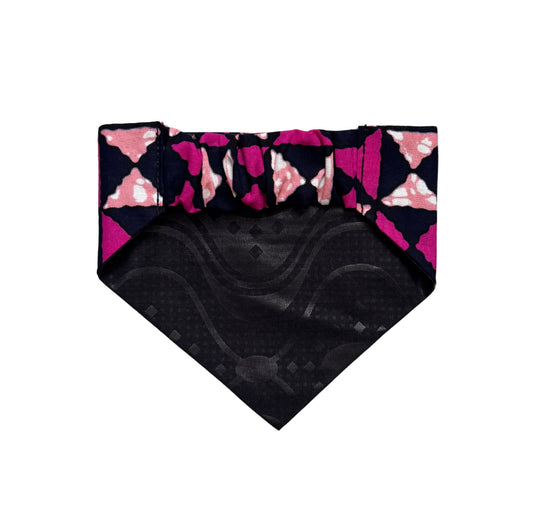 Black with pink and purple patterned scrunchie dog bandana on a white background