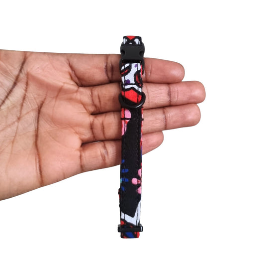 GBEMI black multicolour starburst African print breakaway cat collar by Bhooki, handmade in the UK