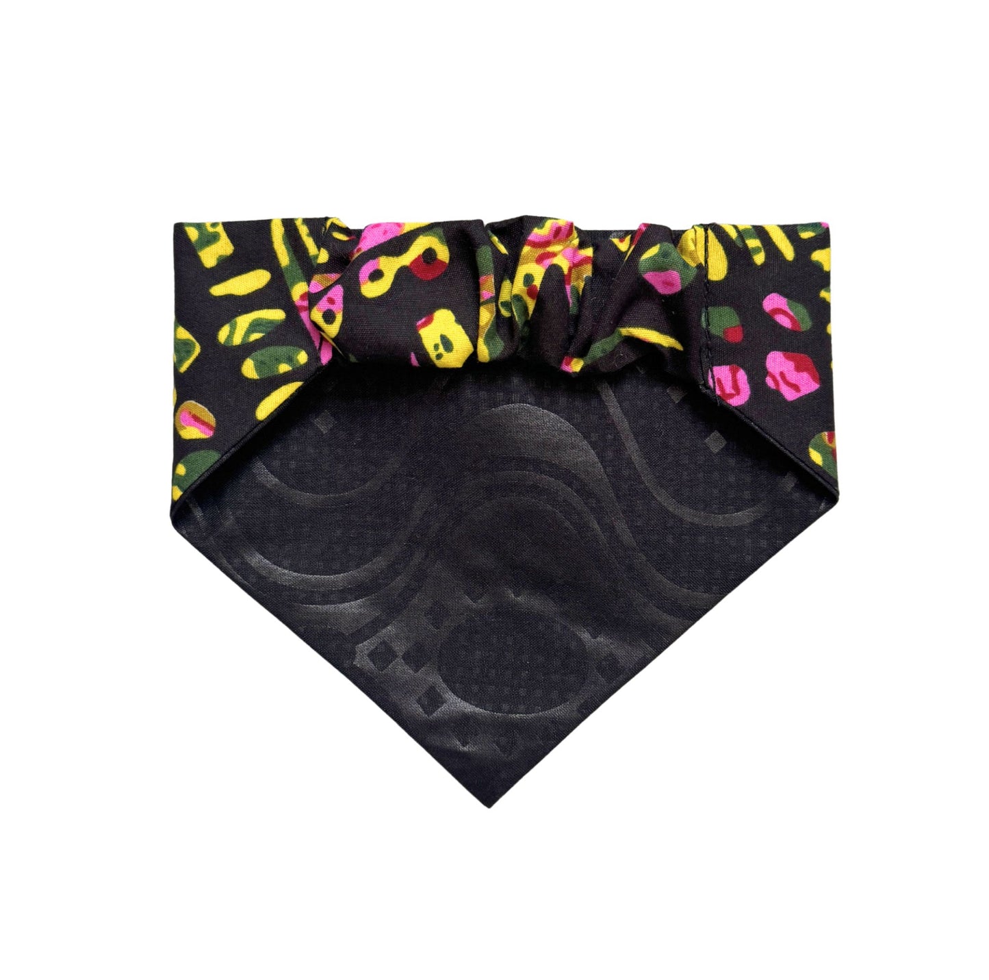 Black scrunchie dog bandana with colorful abstract pattern on a white background