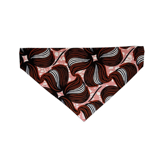 Dog bandana with brown and white leaf pattern on a pink background