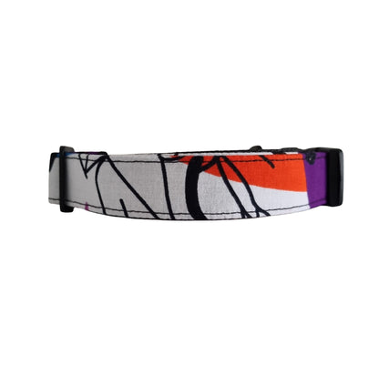 A multicolored geometric patterned dog collar.
