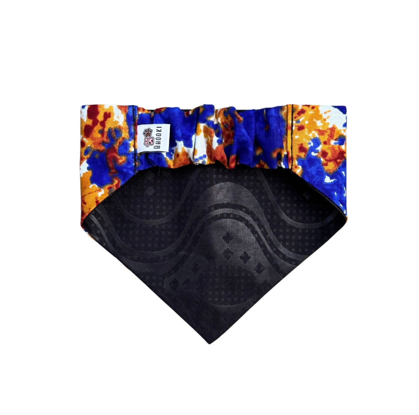 A scrunchie dog bandana with colorful patterned border on a white background