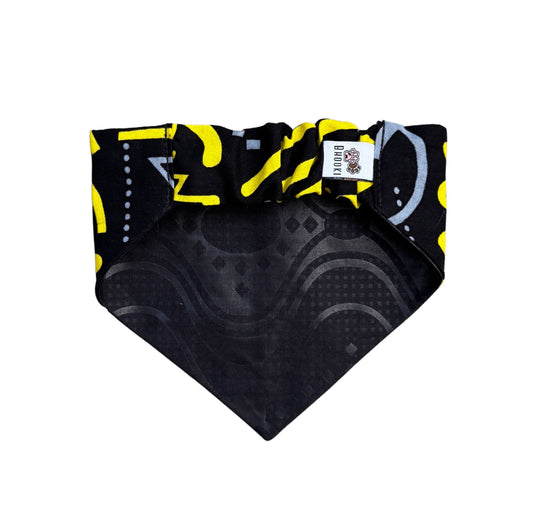 Black and yellow patterned bandana with a brand label on a white background