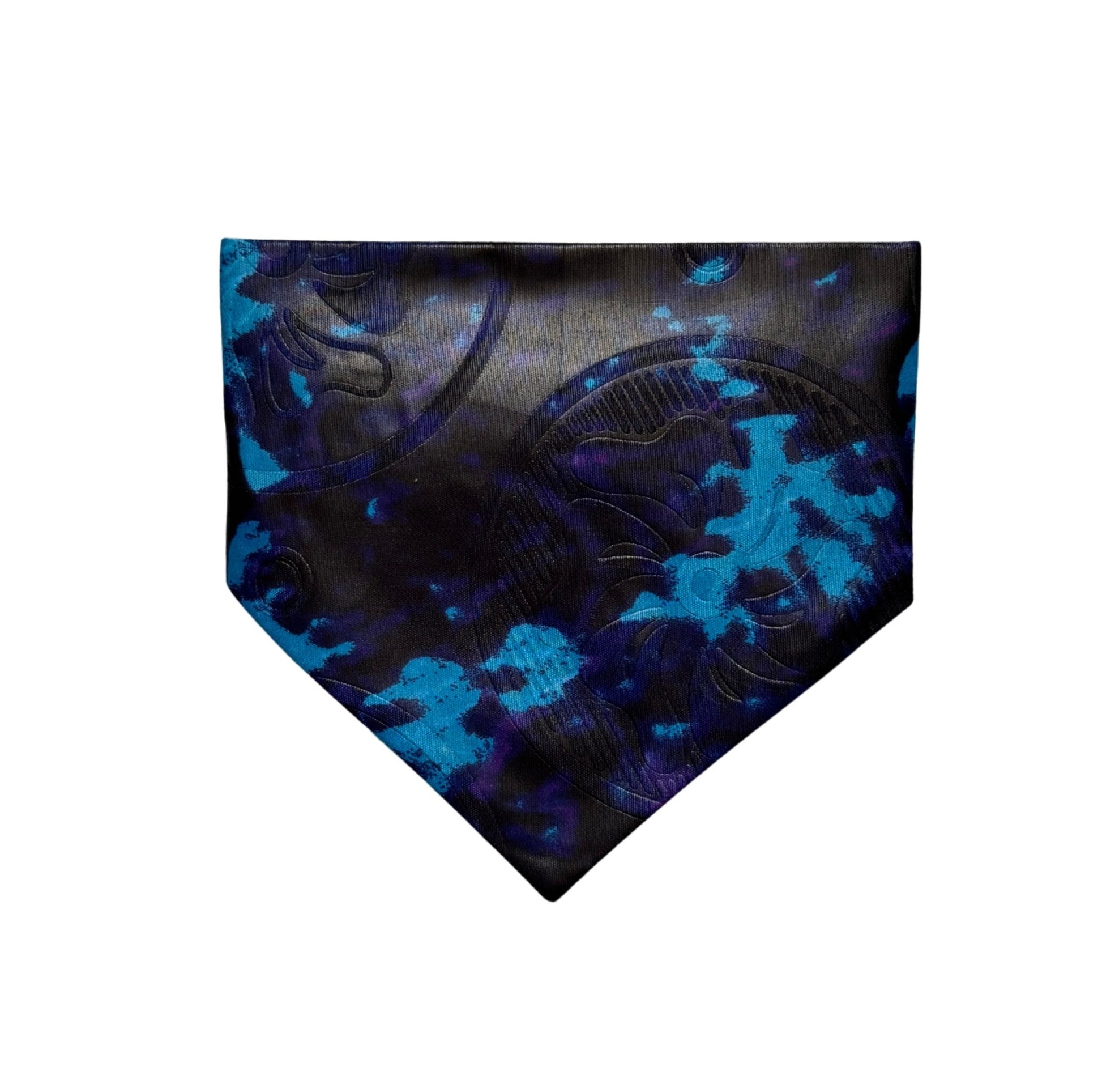 Black and blue tie dye patterned dog bandana on a white background