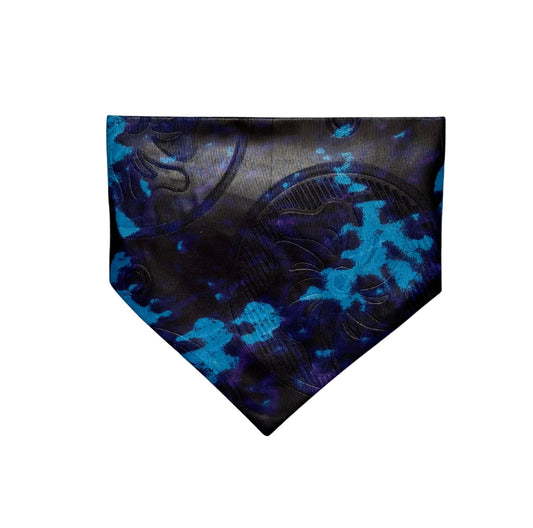 Black and blue tie dye patterned dog bandana on a white background