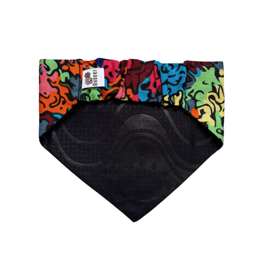 Colorful patterned scrunchie dog bandana with black center on a white background