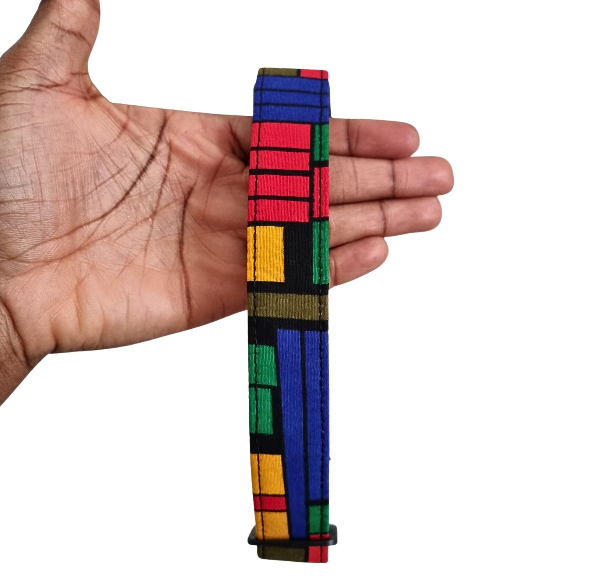 A multicolored geometric patterned dog collar.