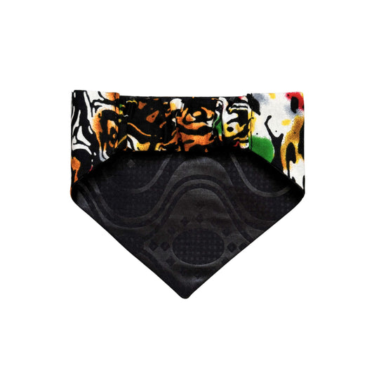 Colorful patterned dog bandana on a white background