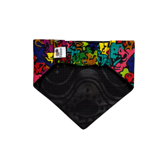 Colourful patterned scrunchie dog  bandana with black on a white background