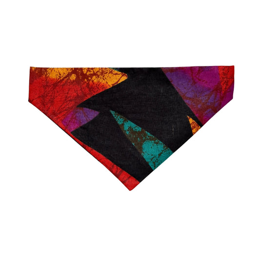 Colorful dog bandana with abstract design on a white background
