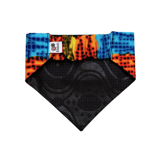 a patterned blue, orange, yellow and brown dog bandana