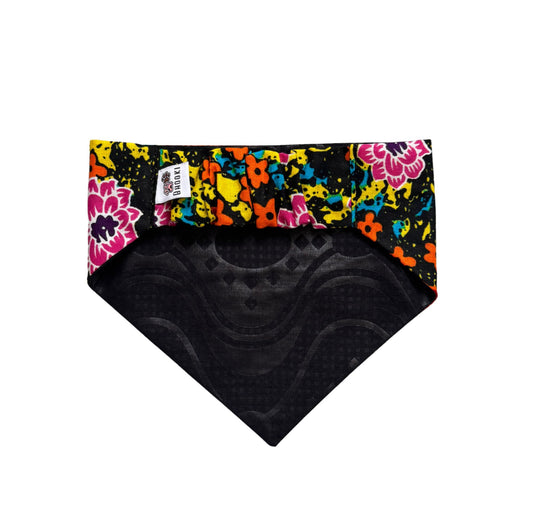 Scrunchie dog bandana with colorful floral pattern on a white background